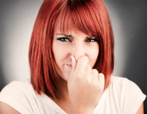 Woman Smells Something Bad